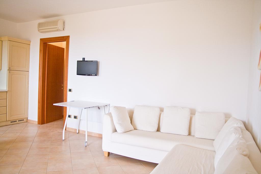 I Mirti Di Porto Pozzo Apartment Luaran gambar